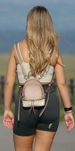 Blonde woman in lycra shorts - good front view, back view ruined by a bag