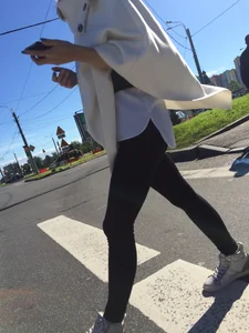 Blonde Girl With Fit Muscular Legs in Tight Black Jeans and Sneakers on a Crosswalk  - Street Creepshots Collection