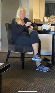 Mature candid blonde in tights and shorts