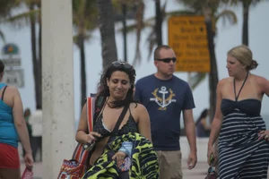 Saint Patrick's Day girls in bikinis at Deerfield Beach in Florida