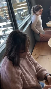 Cute little blue shorts sipping on a latte (VPL and a pokie!)