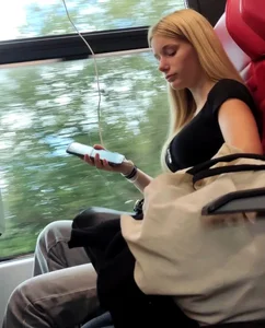 Hot busty blonde on train