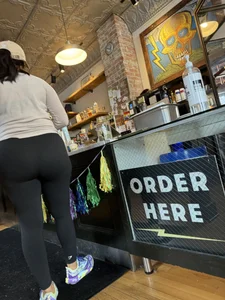 Big ass girl In tights at cafe