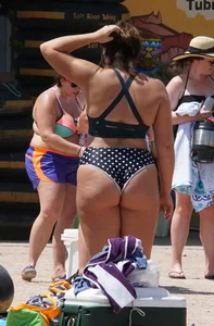 Girls in bikinis getting ready for tubing