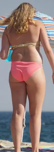 Thick blonde bikini babe on the beach