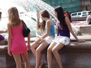 Pink skirt girl upskirted at fountain