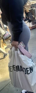 Sexy girl in grey leggings showing ass and cameltoe