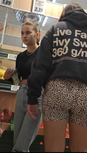 Thick brunette in short leggings and company