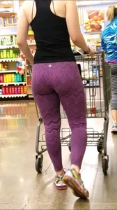 Thick Blonde in purple leggings