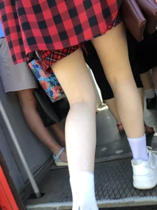 Cute candid teen on a train platform