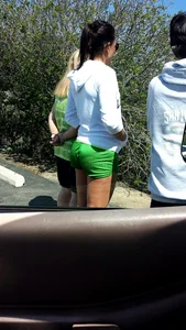 Girl in green shorts