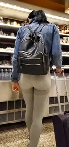Beautiful brunette shopping in tight grey spandex with a great ass