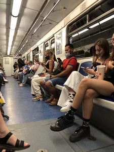 Sexy Teen in Boots  Sitting in a Subway Train With Crossed Legs Pics