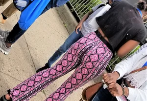 Ebony babes in pink patterned and black leggings with nice asses