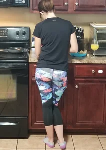 Candid Girl in Colorful Tights and Socks at the Kitchen