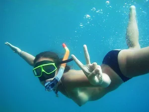 Topless scuba diving girls