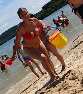 Thick girl with tattoos, big tits and a big booty in a little bikini