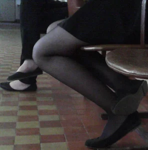 Candid college teen's slim legs in tight pantyhose ans feet in flats closeup
