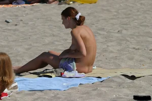 Beach voyeur girls in bikinis, thongs and topless