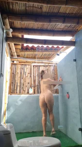 Naked candid milf spycammed while using the toilet and the shower