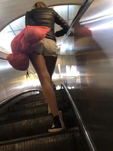 Hot Milf in Mini Shorts on the Subway Escalator and in the Train Candid Gallery