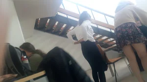 Young girl pulling up her pants