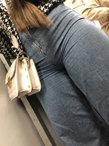 A Cute Candid Girl in Loose Blue Jeans Subway Train Sneaky Photos