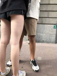 Skinny upshorts booty cheek and long slim legs closeups