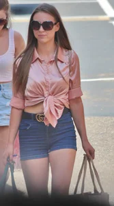 Absolute stunner in shorts and silk blouse