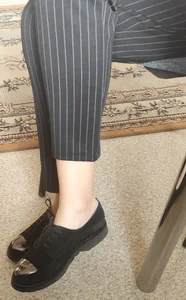 Crossed Legs of a Teen in Pants, Ankles Creepshot
