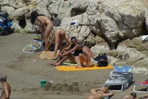 Girls on a nude beach in Sitges, Spain