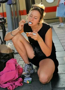 Pretty blonde with a good rack kneels on the platform and spreads her legs for you!