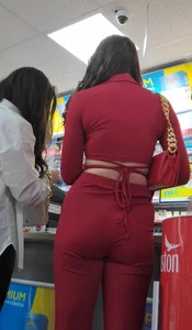 Hot minx in a stunning red outfit