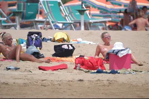 Girls on a nude beach in Bibione, Italy
