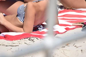 Sexy group of girls on the beach in various sizes