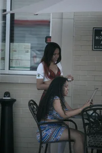 Two sexy Tilted Kilt employees showing cleavage and cheeks