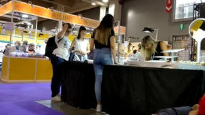 Jewelry vendor in light blue jeans