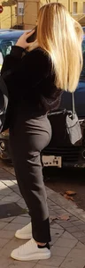 Tiny blonde in black pants