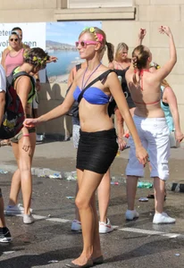 Boobs out in public in either bikini tops or bras