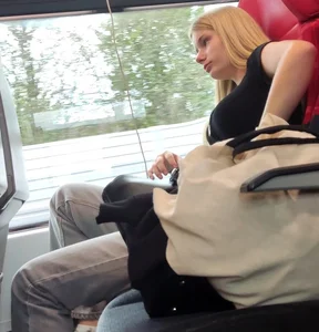 Hot busty blonde on train