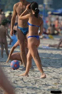 Beach voyeur girls in bikinis, thongs and topless