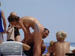 Beach voyeur babes in bikinis, thongs and topless