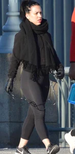 Brunette walking in leggings with a thick booty and showing some camel toe