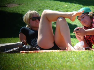 Bunch of sexy girls upskirted at parks showing their panties and asses