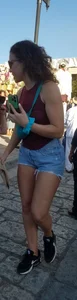 Laughing girl in shorts, legs and thick peach