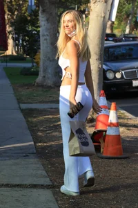 Alexis Ren at Moon Juice with hard nipples and a great ass in white tight sweats