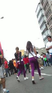 Girl out with a friend in purple leggings with a nice ass and slight vtl