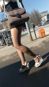 Girl in High Heeled Sandals and Shorts in Pantyhose with Long Hot Legs City Candid