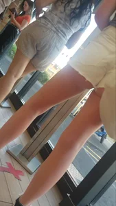 Skinny Candid Girl in White Shorts Making an Order in a Cafe Creepshots Gallery