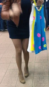 Hot legs in pantyhose and booty in skirt at the store creepshots